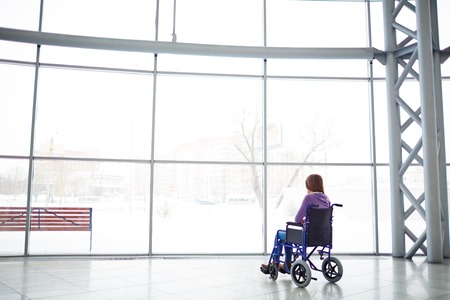 Lonely woman in wheelchairの写真素材