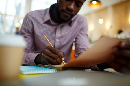 Sketching in notepadの写真素材