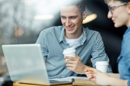 Doing homework togetherの写真素材