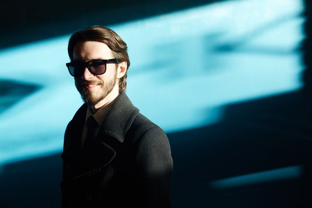 Handsome Businessman Wearing Sunglasses and Coat