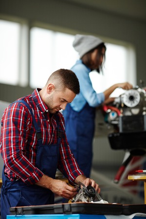 Two Mechanics in Workshopの写真素材