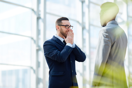 Happy Businessman Talking to Partnerの写真素材