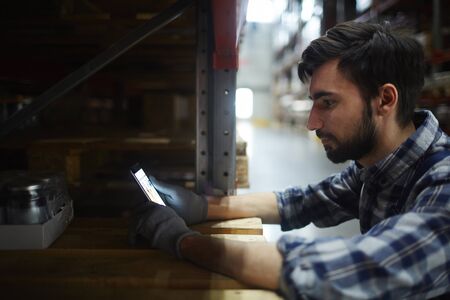 Worker with smartphone