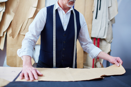 Tailor Making Bespoke Clothes in Atelierの写真素材