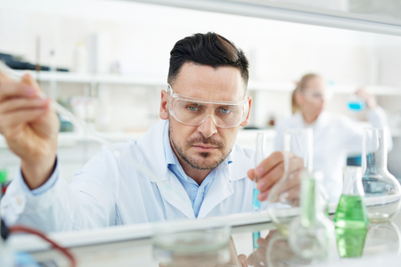 Focused Bio Chemist Working in Labの写真素材