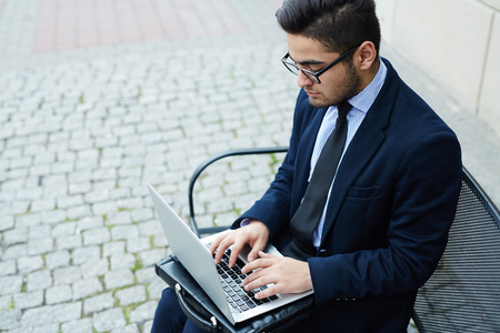 Browsing outdoorsの写真素材