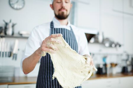 Working with doughの写真素材