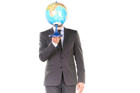 Portrait of middle-aged business person holding globeの写真素材