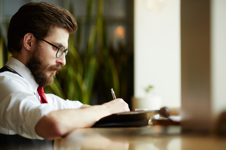 Writing in diaryの写真素材