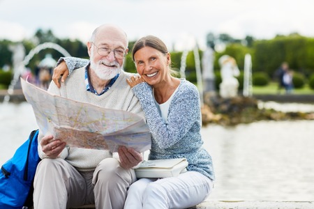 Seniors with mapの写真素材