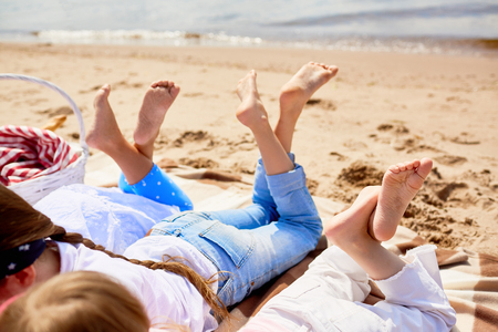 Relaxing on sandの写真素材