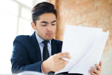 Working with papersの写真素材