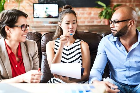 Sharing Creative Ideas with Coworkersの写真素材