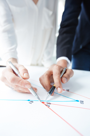 Discussing Business Graph with Colleagueの写真素材