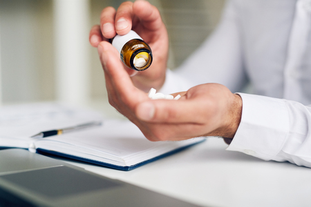 Taking tabletの写真素材