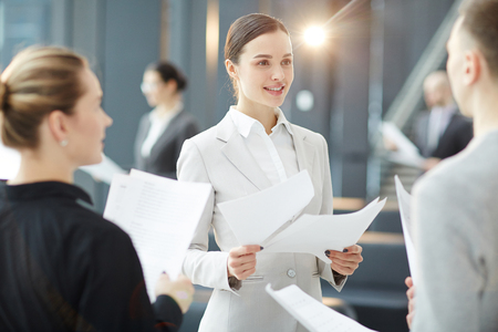 Discussing financial papersの写真素材