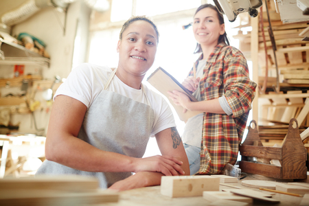 Women in carpenter workshopの写真素材