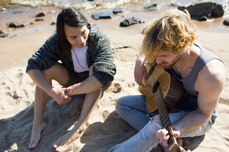 From above men playing guitarの写真素材