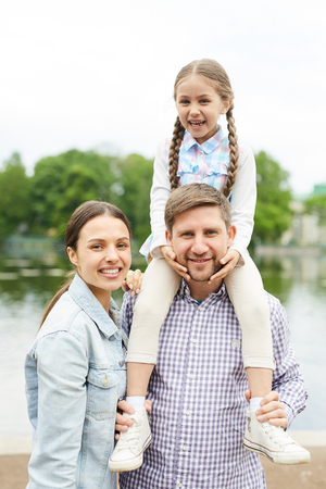 Family by watersideの写真素材