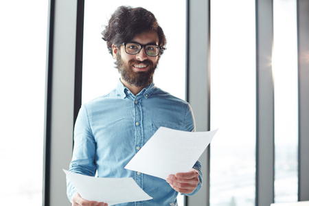 Businessman with papersの写真素材