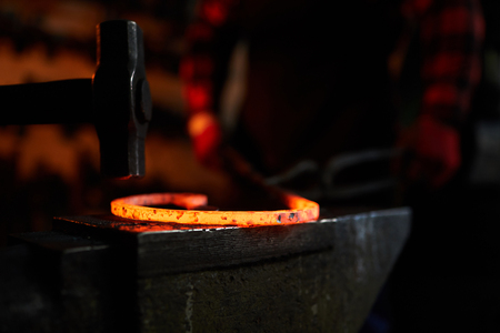 Hammer and molten metal