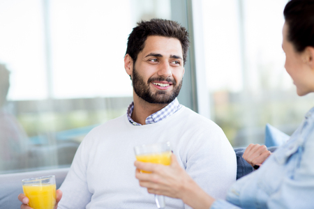 Couple in hotel cafeの写真素材