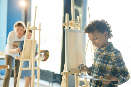 Boy with paletteの写真素材