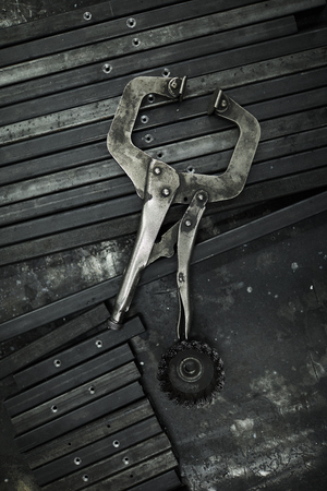 Pincers and steel wire brushの写真素材