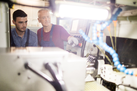 Factory workers working in team