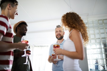 Chatting at partyの写真素材