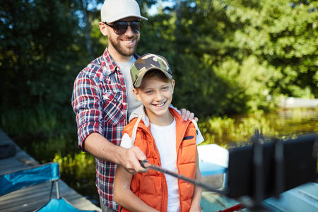 Family selfie portrait outdoorsの写真素材