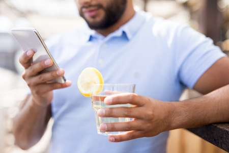 Contemporary Man Using Smartphoneの写真素材