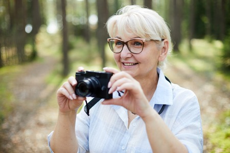 Woman photographingの写真素材