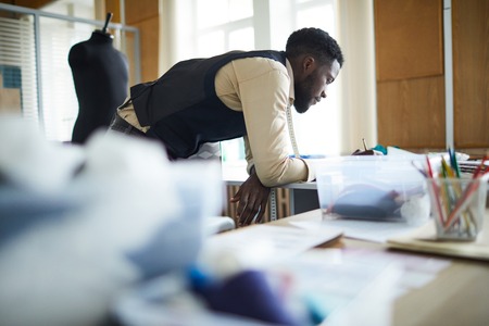 Tailor working in studioの写真素材