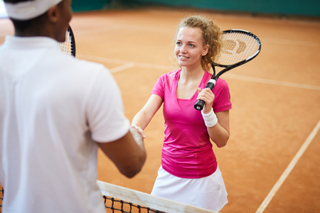 Handshaking on the courtの写真素材