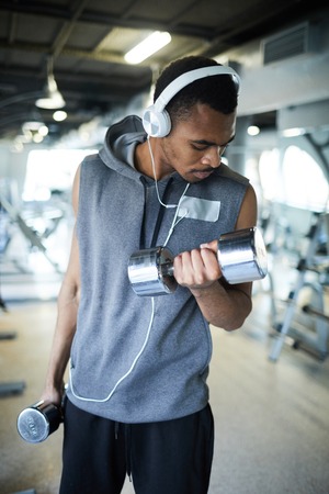 Man training with dumbbells