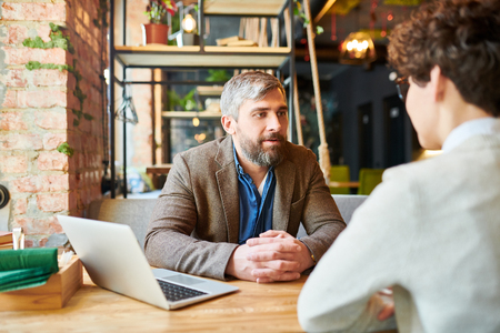 Interaction in cafeの写真素材