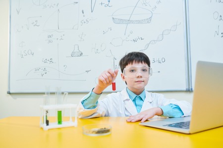 Pupil with flaskの写真素材