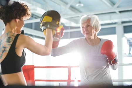 Training on boxing ringの写真素材