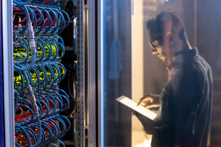IT engineer testing new supercomputer
