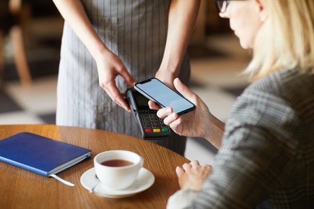 Paying by mobile appの写真素材