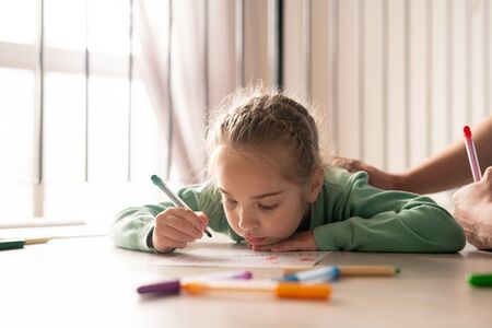 Serious girl coloring picture