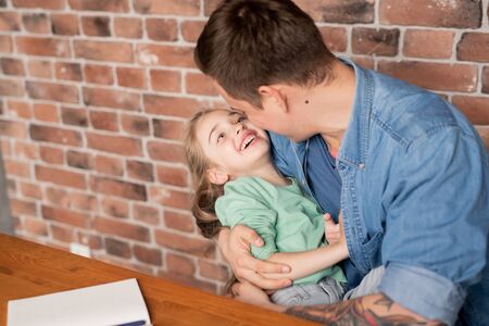 Hugging beautiful daughter