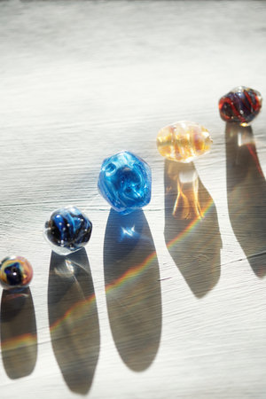 Row of glass beads of various colors, sizes and shapes for necklaces and shadows