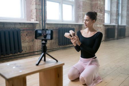 Woman talking about ballet industryの写真素材