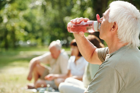 Senior man drinking waterの写真素材