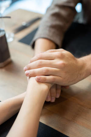 Heap of hands of romantic dates expressing love and affection to one anotherの写真素材