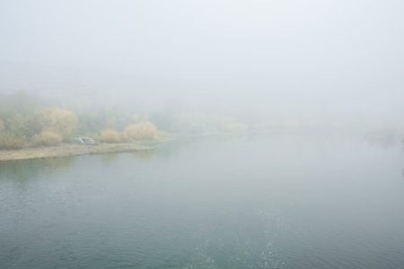 Beautiful view of large lake or river with ripples on glittering surface