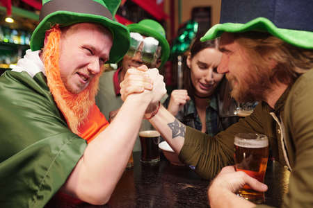 Arm wrestling during the holidayの写真素材