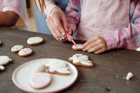 Family decorating cookiesの写真素材